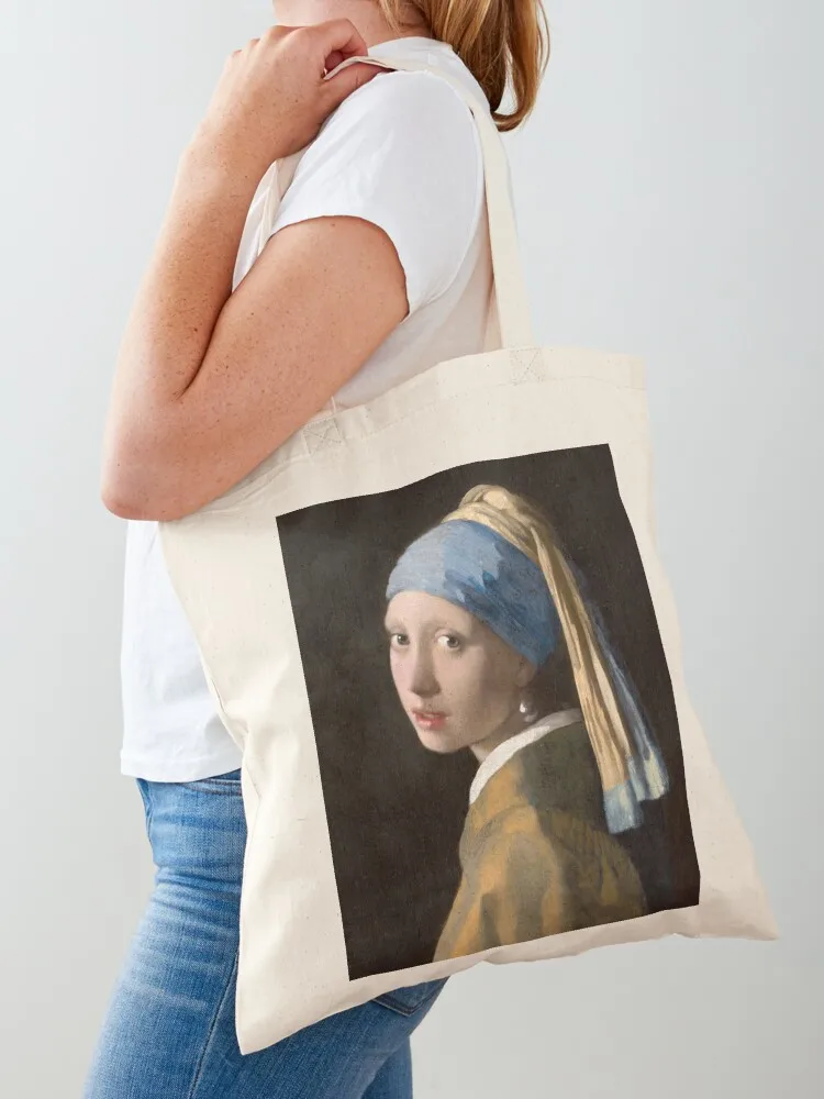 

Girl with a Pearl Earring Famous Painting by Johannes Vermeer’s 1665. Perfect gift for Art Lovers and a beautiful addit Tote Bag