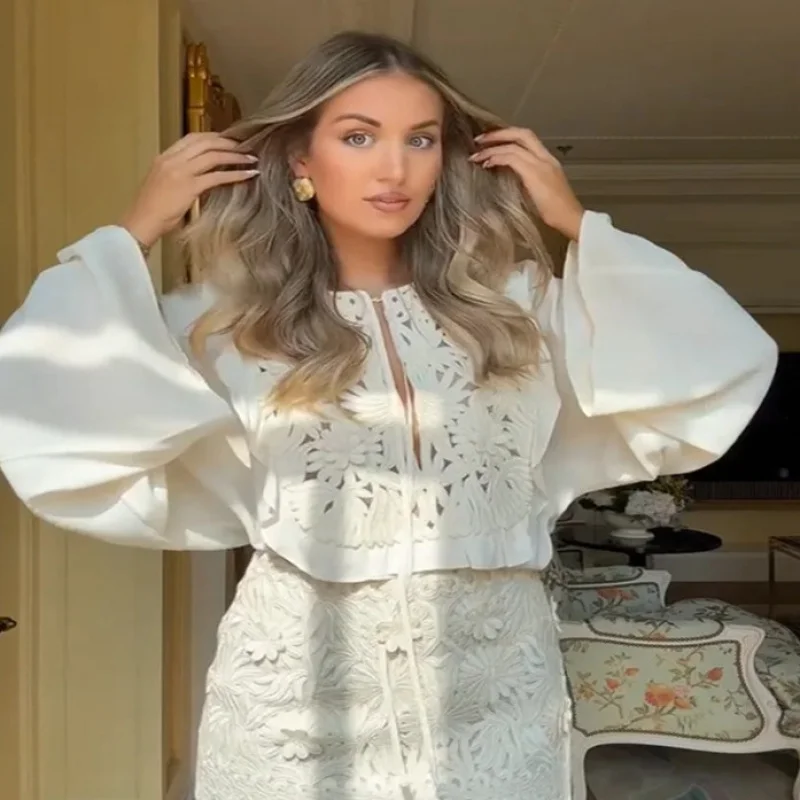 

New European American Women's Fashion Hot-Selling Hollow Embroidery Flared Sleeve Shirt and Short Skirt Set
