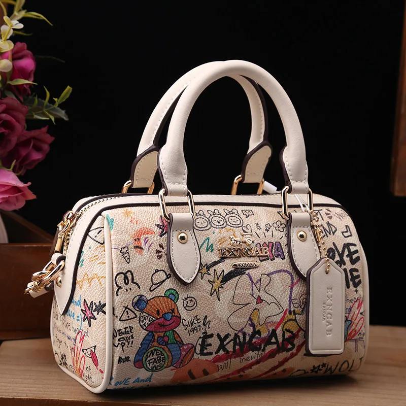 Luxury and Vintage Handheld Boston Bag with Fashion Cartoon Graffiti and Premium Leather 2026 Women's Newly Trendy Crossbody Bag