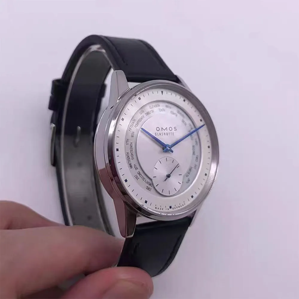 High-end men's 40mm automatic mechanical watch with hollow carved design, waterproof, calendar watch.