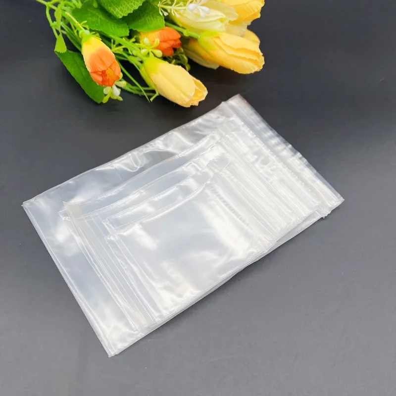 1000 ชิ้นถุงพลาสติกใสถุง Ziplock นํากลับมาใช้ใหม่ถุงของขวัญสีขาวสําหรับเครื่องประดับงานแต่งงานถุงบรรจุภัณฑ์ Reclosable Mini กระเป๋าเก็บ