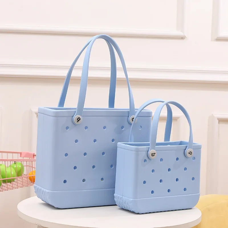 The trendy ladies bags are stylish and minimalist hollowed out candy colored portable vegetable basket bags handbags  bags