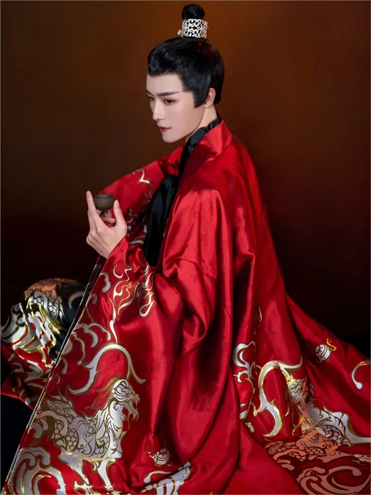 The Hanfu men's Taoist robe style with a woven gold cape and cross-collar features Chinese that is not ancient costume