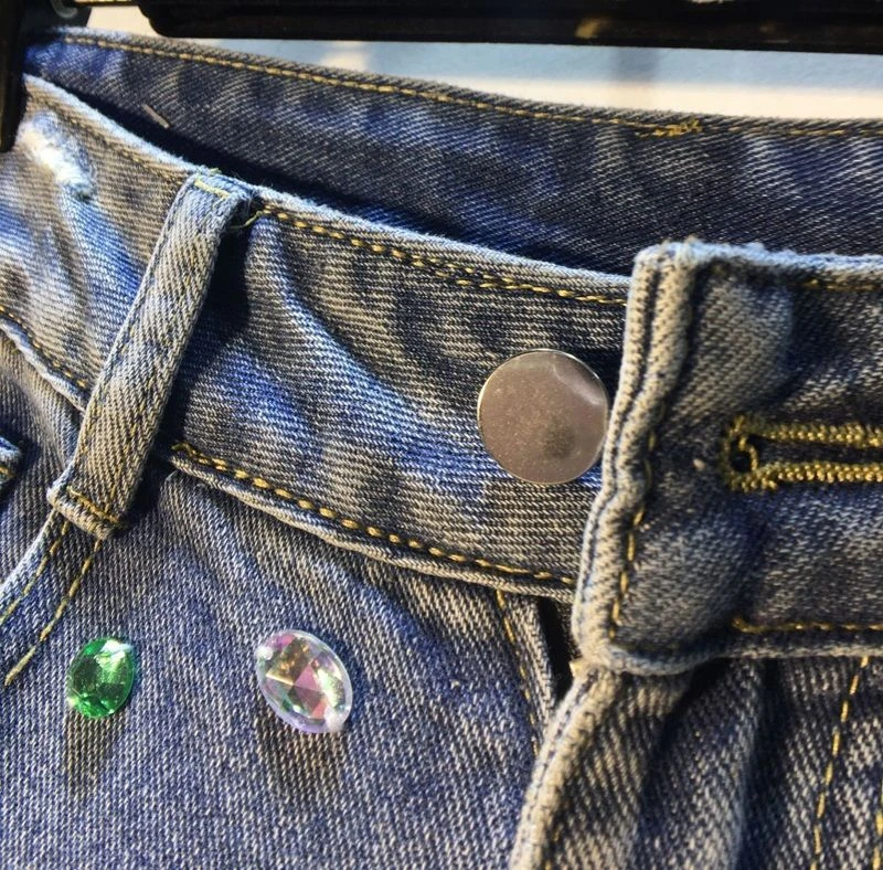 Distintivo nuovo stile industria pesante pantaloncini con perline vita alta stile occidentale pantaloni blu denim dritti strappati dimagranti da donna