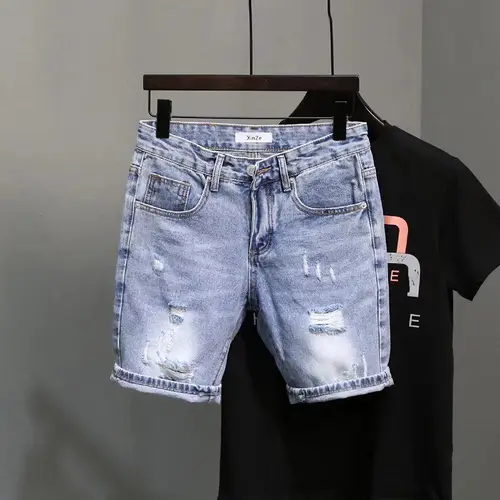 Pantalones cortos vaqueros de moda de verano para hombre, pantalones finos coreanos rasgados de cinco puntos, tendencia elástica, pantalones medios de marca Ins para chicos
