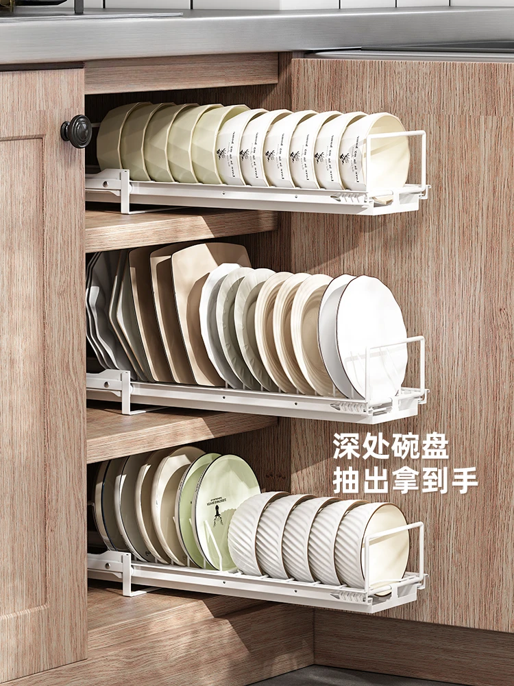 

Pulling out the dish storage rack, placing dishes in the kitchen cabinet, pulling baskets, drawer style storage, dishes, baskets