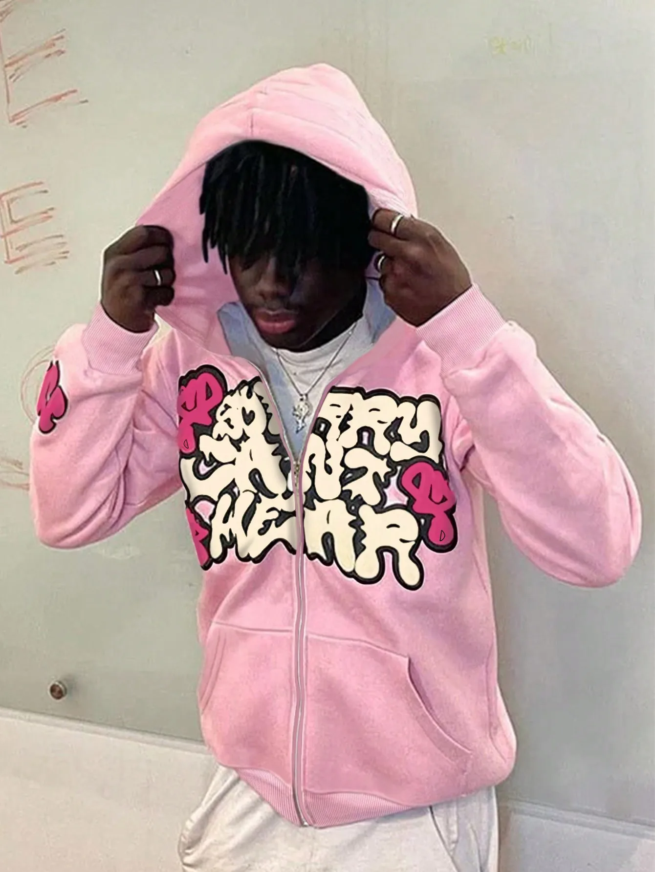 

Pink Zip-Up Hoodie with Bold Graphic Print for Casual Fall Wear