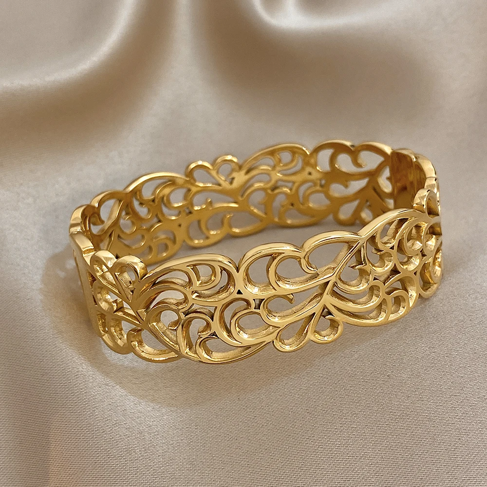 Freetry خمر الفولاذ المقاوم للصدأ الكفة واسعة سوار للنساء العصرية الذهب اللون الجوف خارج زهرة الإسورة هدايا مجوهرات مقاوم للماء