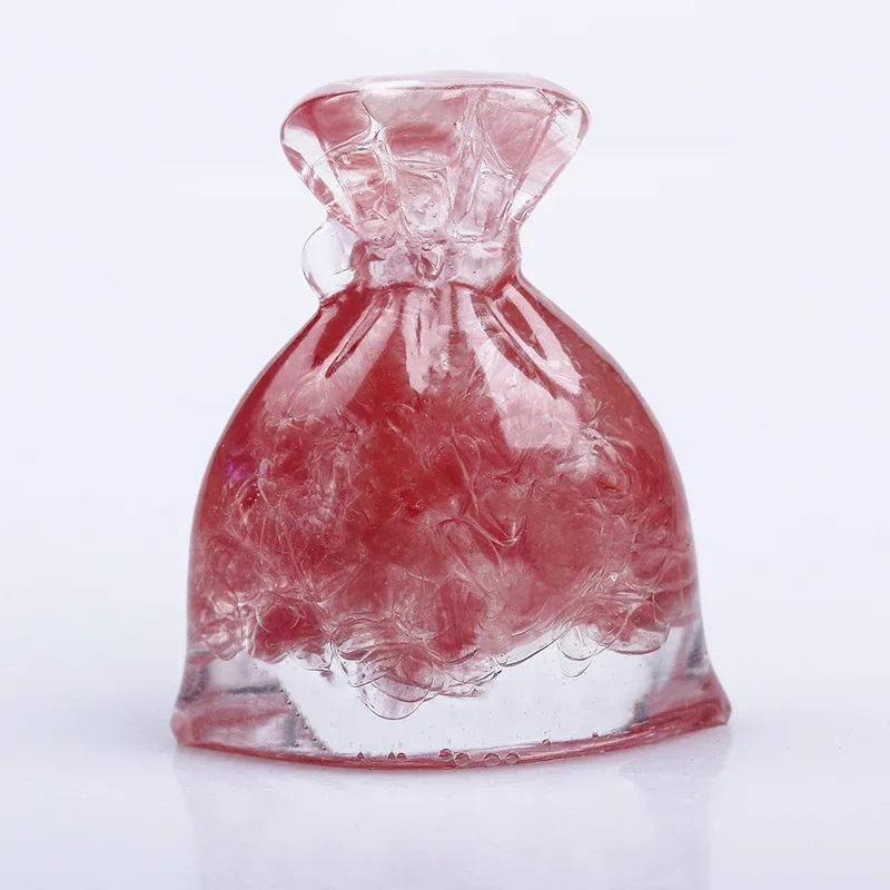 A handmade drop glue money bag small ornament is lucky, strawberry crystal amethyst aquamarine desktop ornament.