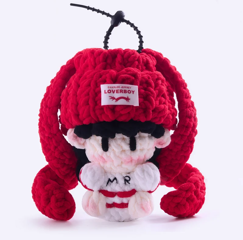 Celebrity merchandise, handmade crocheted dolls, concert support materials, and keychains.