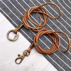 Correa de cuero genuino para el cuello, cordón para bolso de teléfono móvil, llaves, identificación, tarjeta de crédito, llavero, cuello, collar DIY, 1 unidad