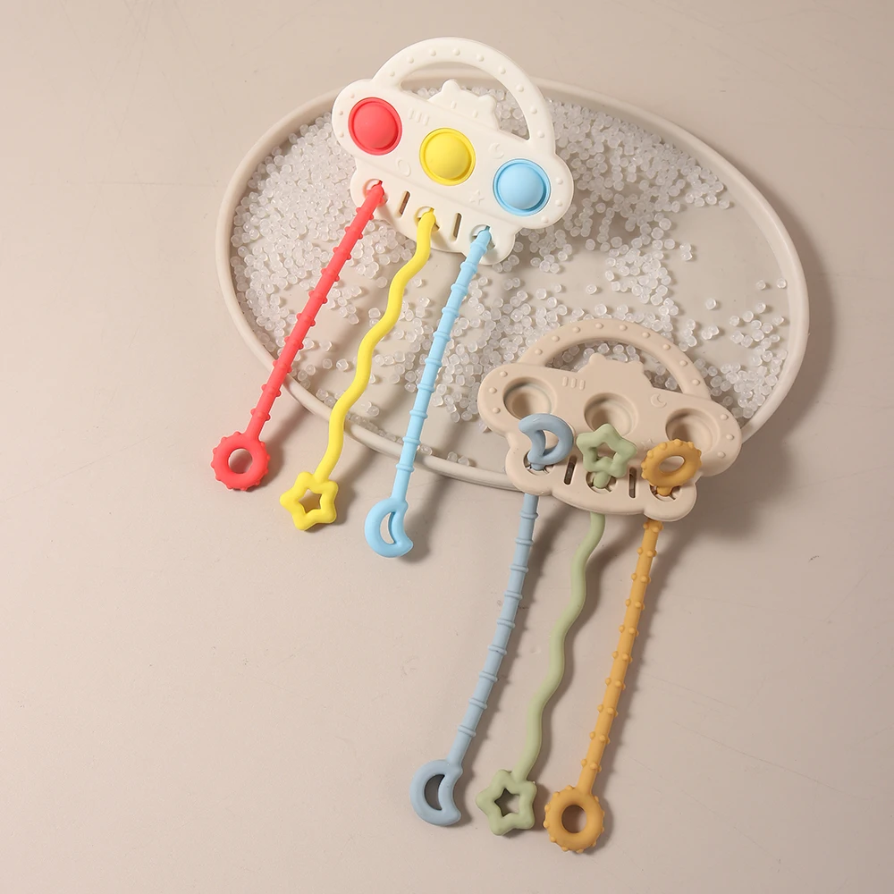 Baby Silicone Teether Toy  Press & Pull String Sensory Toy  infant teether food grade interactive