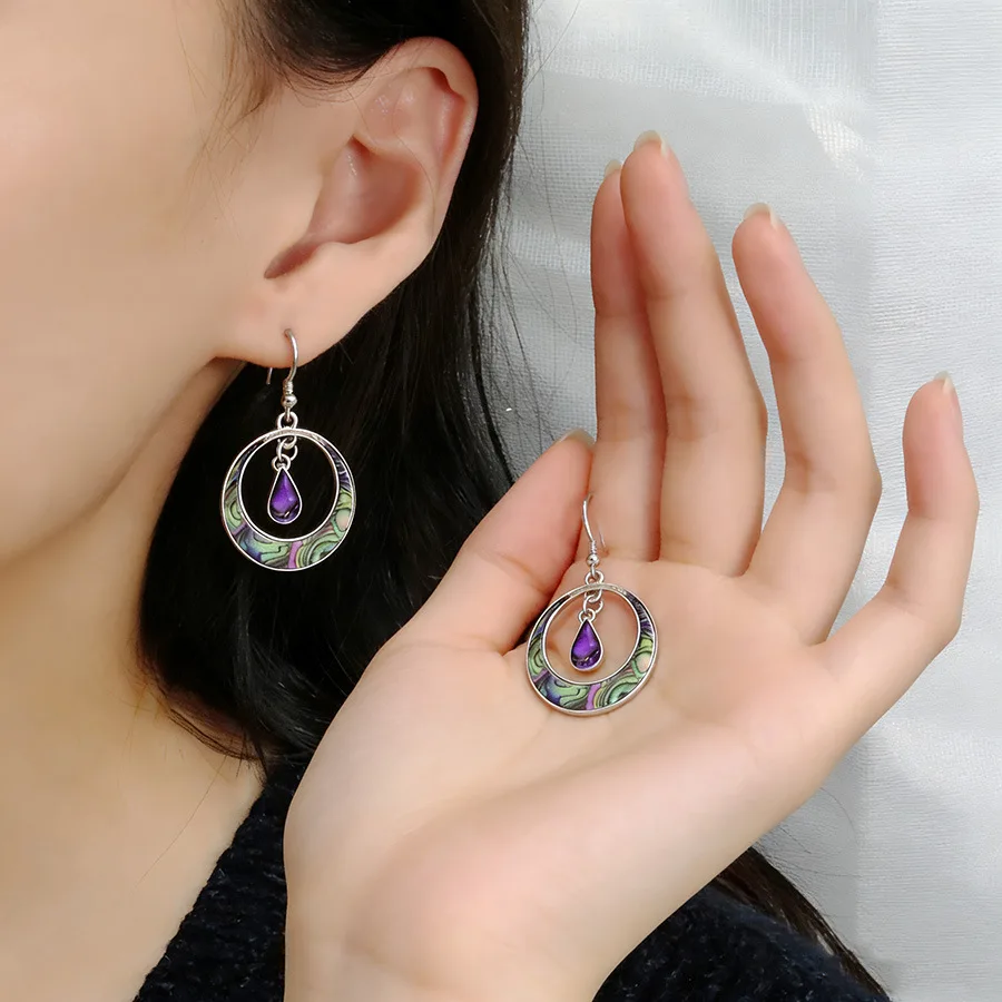 

European and American cross-border fashion retro bohemian earrings round hollow pattern water drop earrings exquisite temperamen