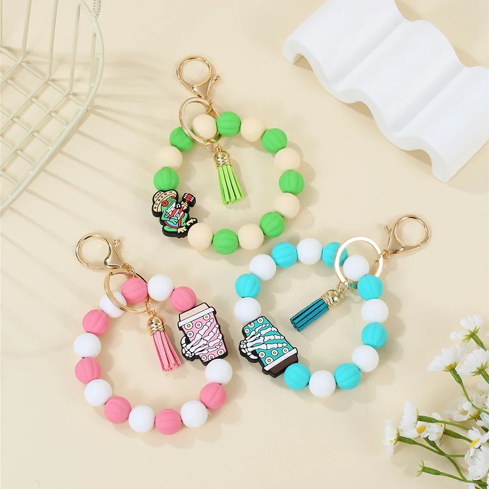 Cartoon PU Leather Tassel Keychain Creative Color Silicone Bead Keychain Women's and Men's Bracelet Keychain Jewelry Gift