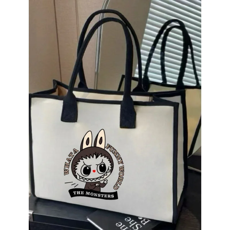 

Labubu Cartoon Shoulder Bag Large Capacity Tote Canvas Bag Commuter All-in-one Art Bag Student Shoulder Bag Women's Casual Bag