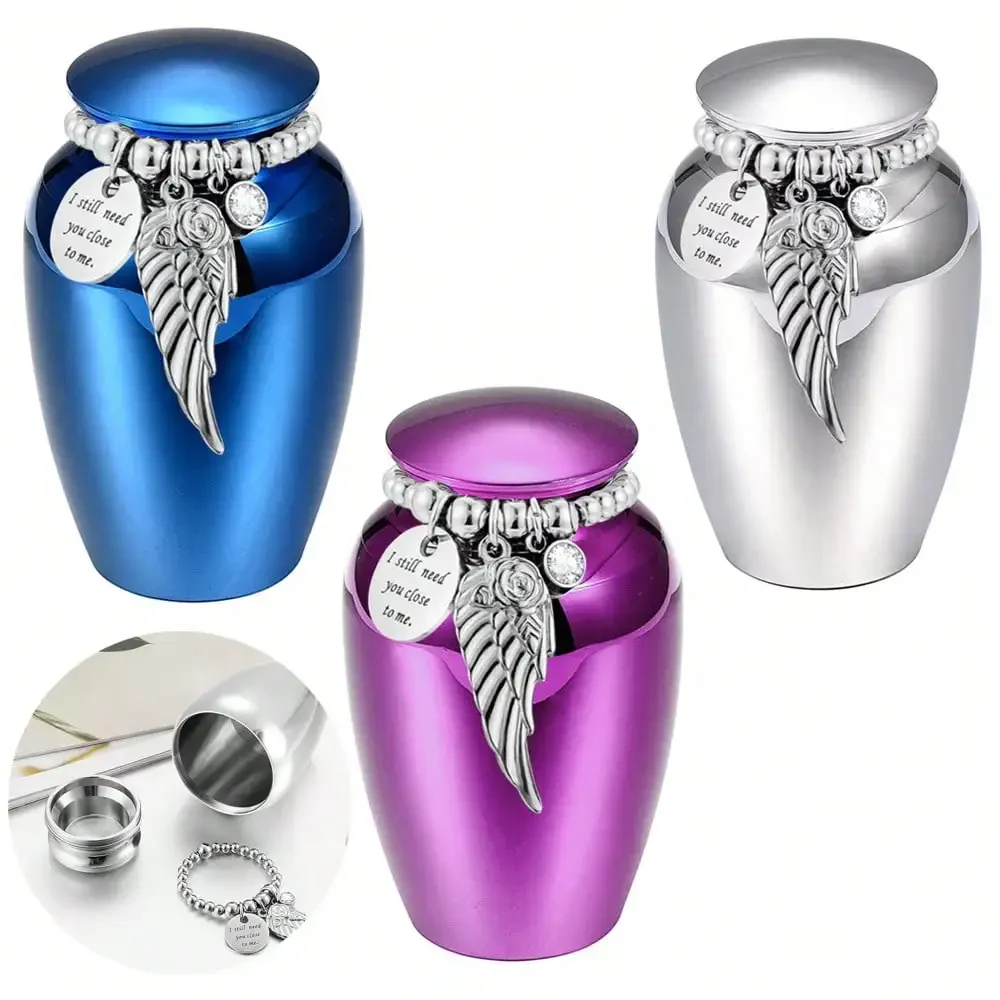 

Small Keepsake Urns For Memorial Human Pet Ashes 2.56 Inch With Wing Charm Mini Cremation Urns Aluminum Alloy