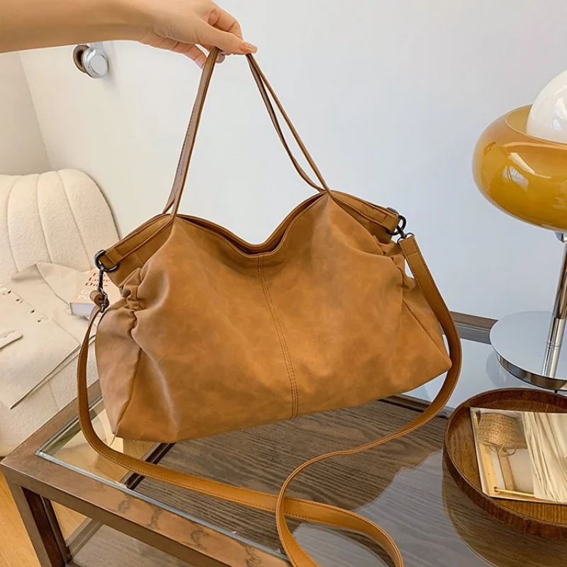

Elegant Tote Bag For Ladies Made Of Premium Leather, Spacious Interior By Luxury Brand With Zipper Top Closure