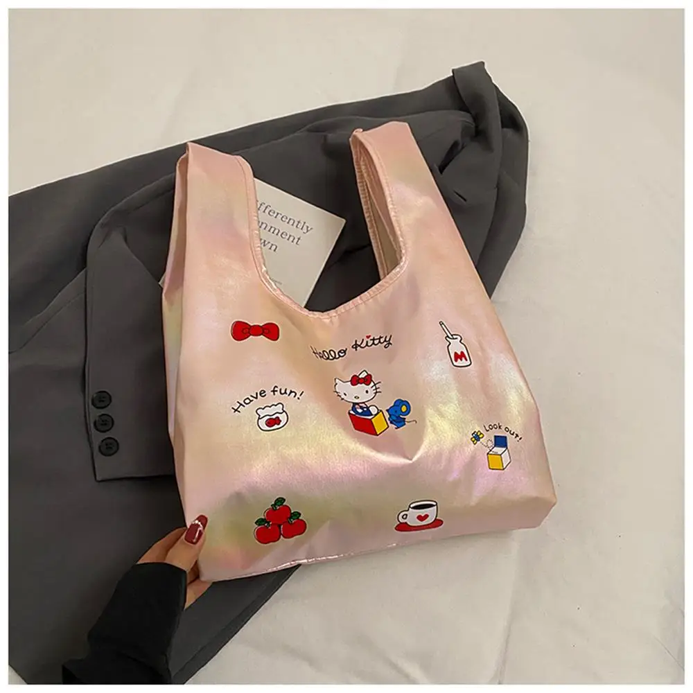 

Japanese girl heart KT cat Katie cat hand-held shopping bag 2025 new cute cartoon niche laser handbag