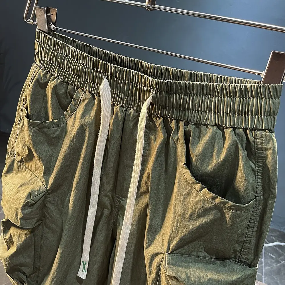 Calça com cordão solta masculina, shorts com cordão, estilo fino, preta, confortável, com tudo a combinar, bolso grande, verão