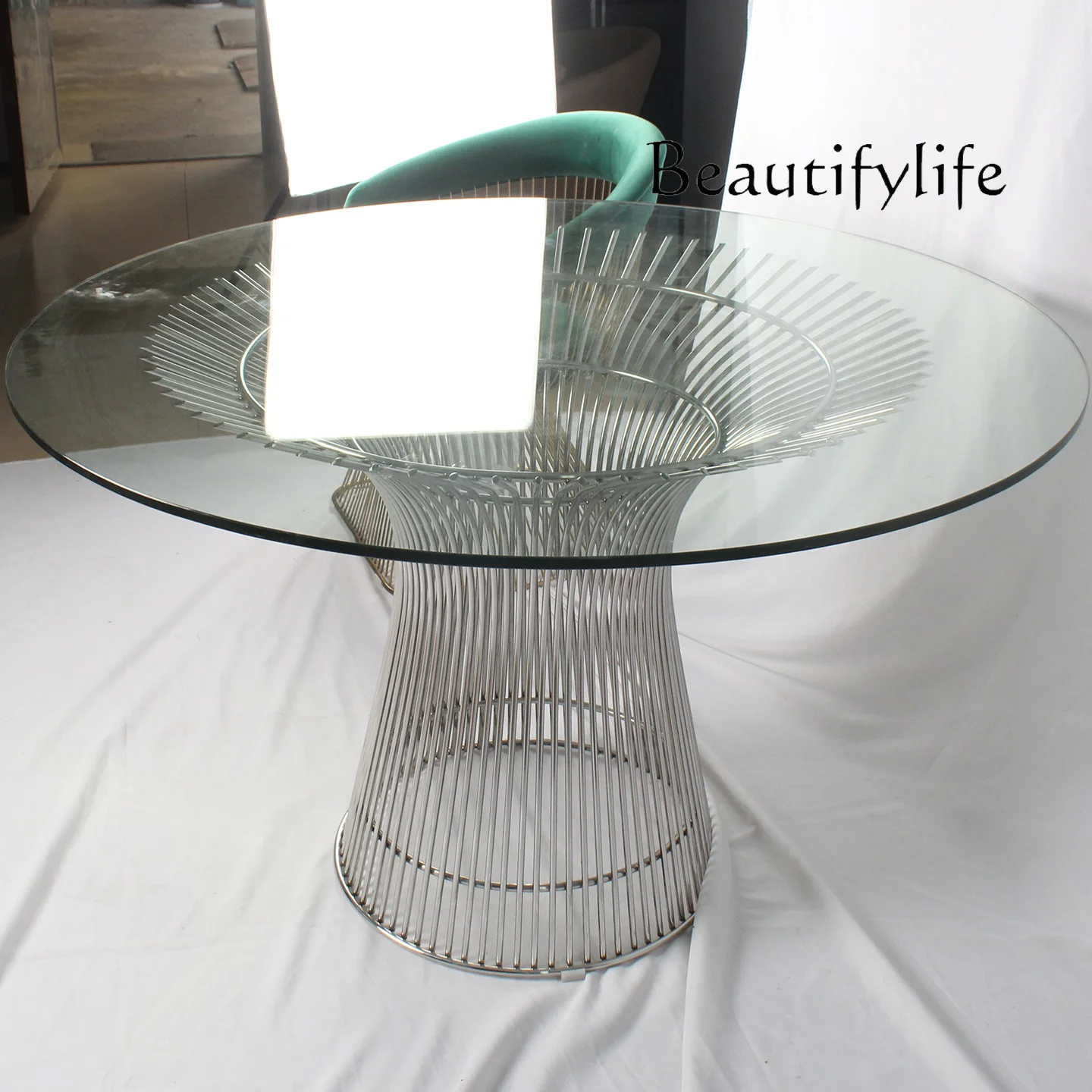 

Light luxury round dining table stainless steel small apartment household dining table tempered glass designer fashion