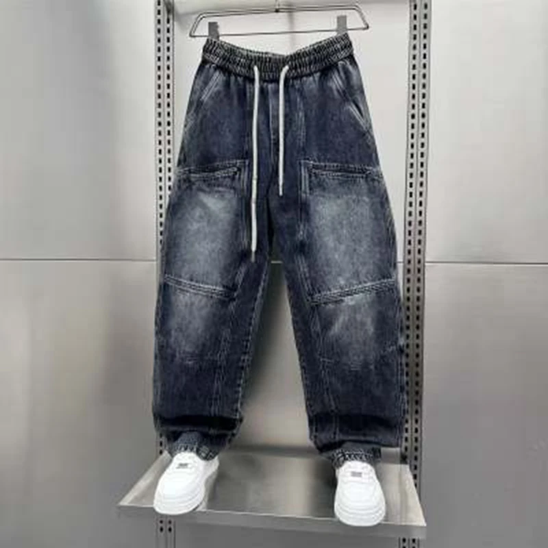 Spring Autumn 2026 New Splicing Cutting Elastic Waist Large Size Mans Washed Loose Wide Leg Big Pocket Scimitar Drawstring Jeans