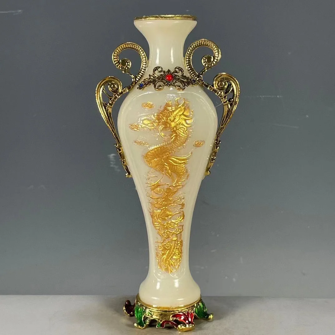 

Китайская антикварная керамика, бронзовая ваза со светящимся позолоченным драконом и феніксами, сделанная в период династии Цин.