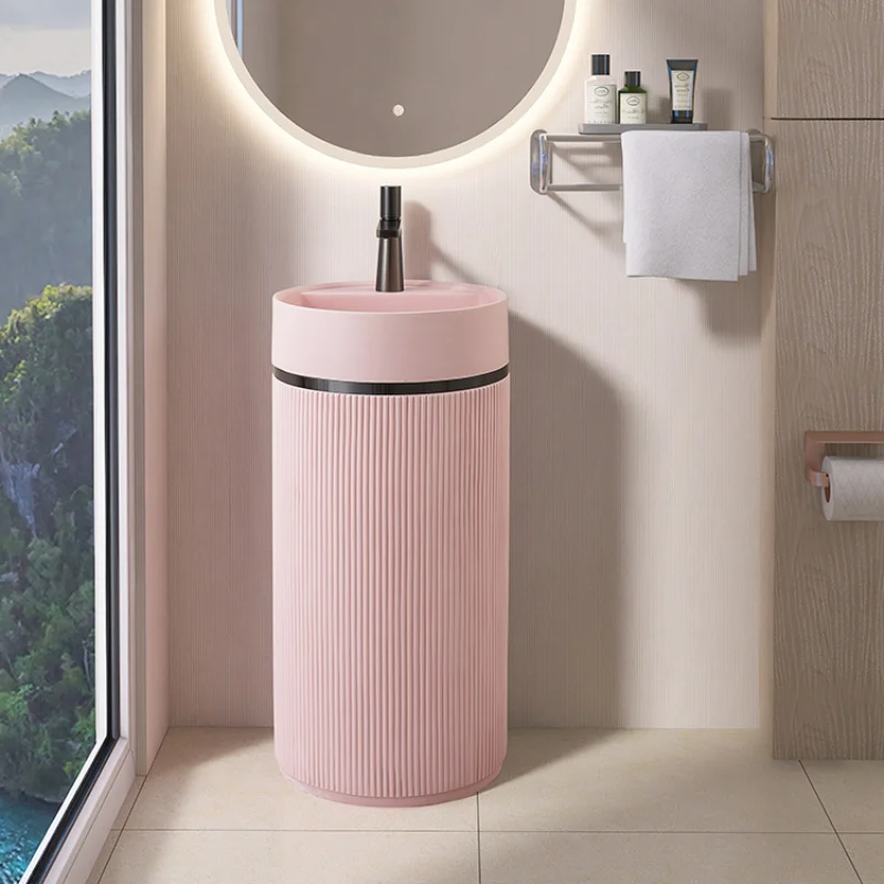 Pink personalized face wash table integrated floor wash basin circular minimalist art column basin