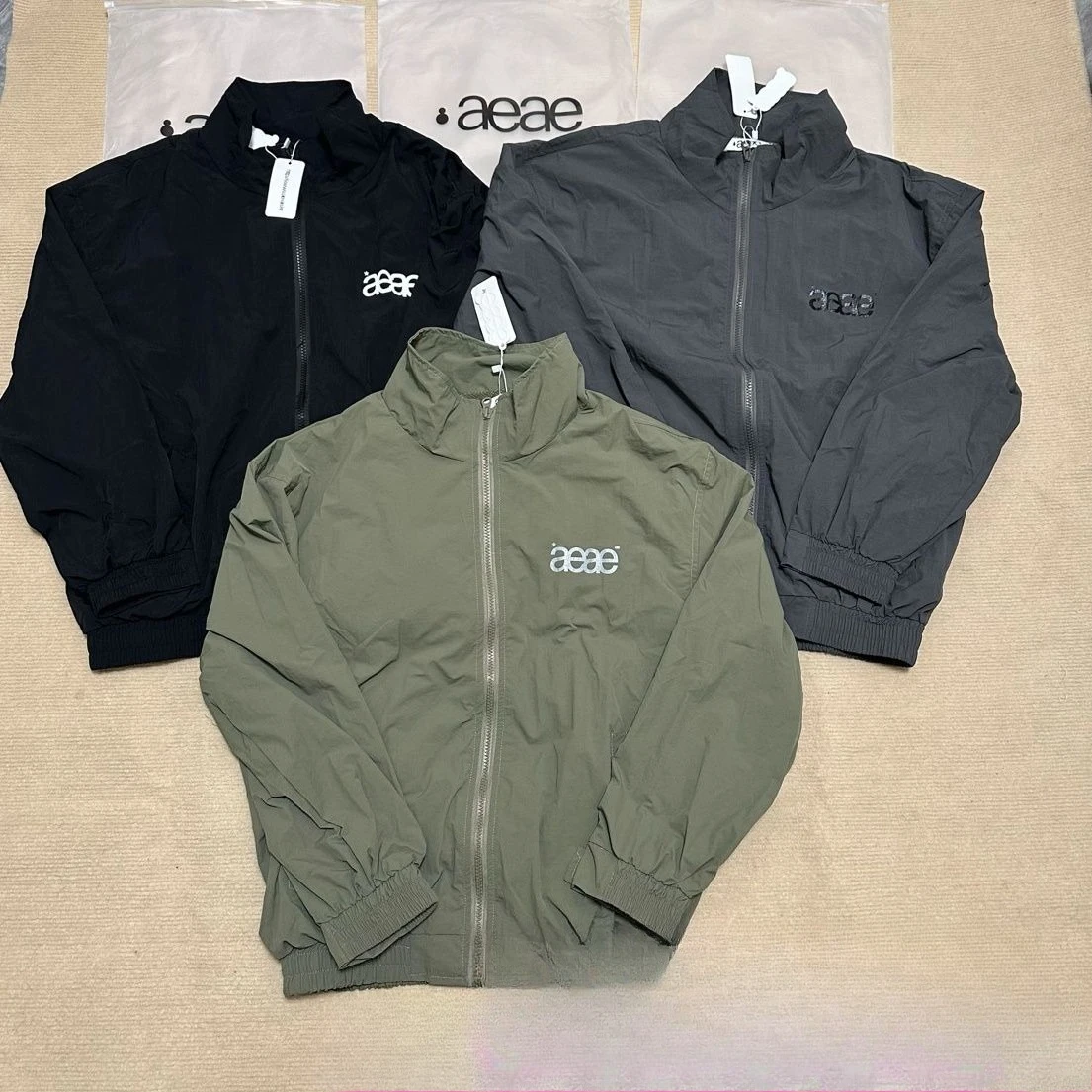 

Корейская куртка с воротником-стойкой и принтом букв Ae, женская осенняя новая повседневная свободная солнцезащитная ветрозащитная уличная куртка, куртка для пар