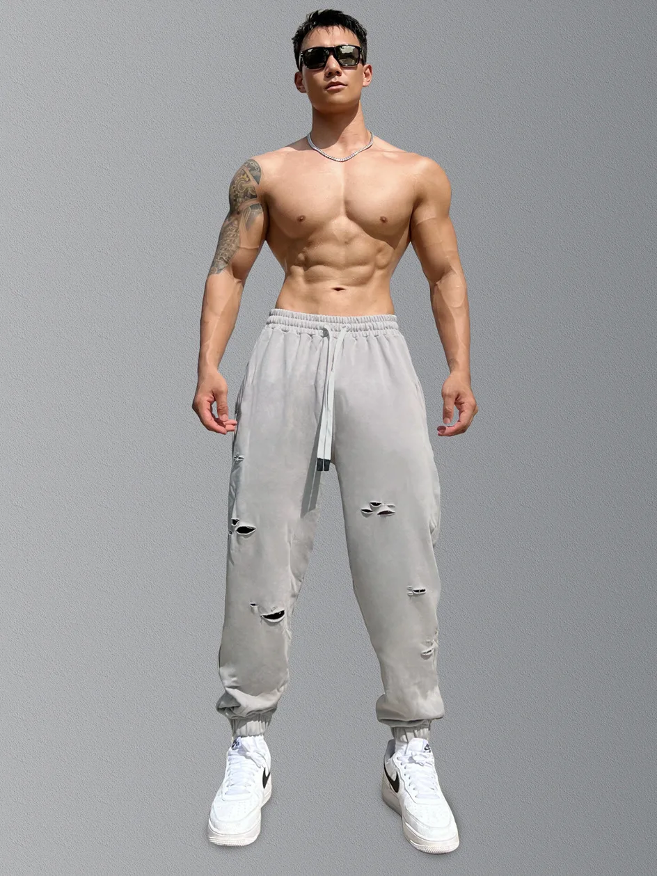 

Fitness American corset pants men's loose drawstring basketball running training ripped loose sports long pants casual