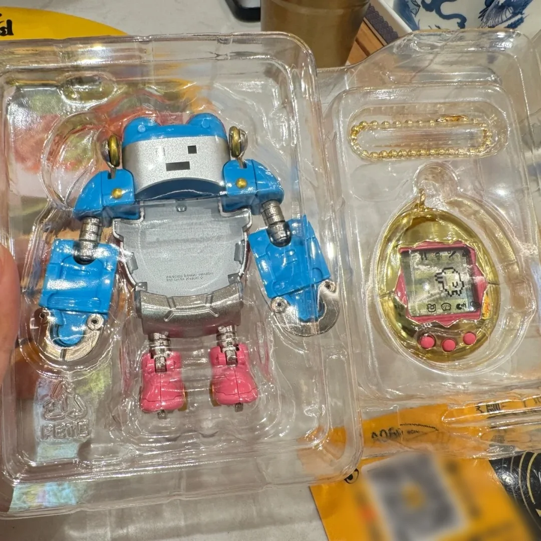 本物のバンダイ超合金たまごっち変形ロボットモデル変形能力 10 センチメートルアクションフィギュア模型玩具