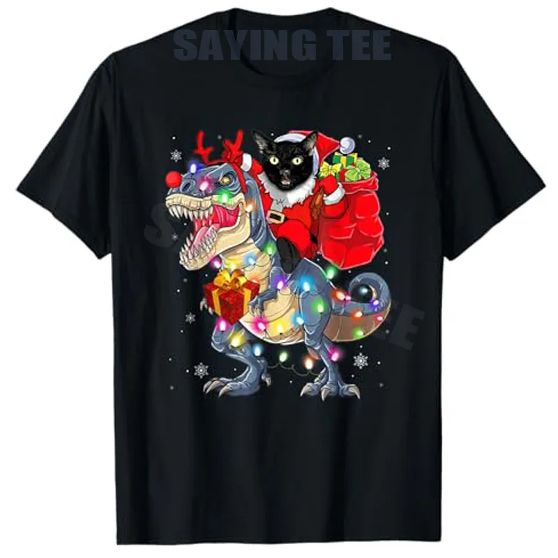 

Funny Santa Cat Riding T-Rex Dinosaur Xmas Lights T-Shirt Y2k Kitty Dino Fans Aesthetic Clothes Novelty Gift Humor Graphic Tees
