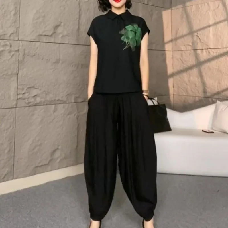 2025 Stampa femminile Top Pantalons Abito a due pezzi Pantaloni moda donna coreana Pantaloni lanterna manica corta da donna estiva 2 pezzi