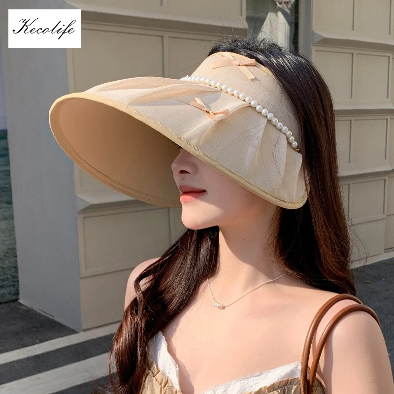 

Summer sun hat female pearl bow large brim visor hat Korean fashion small fragrant wind empty top sun hat