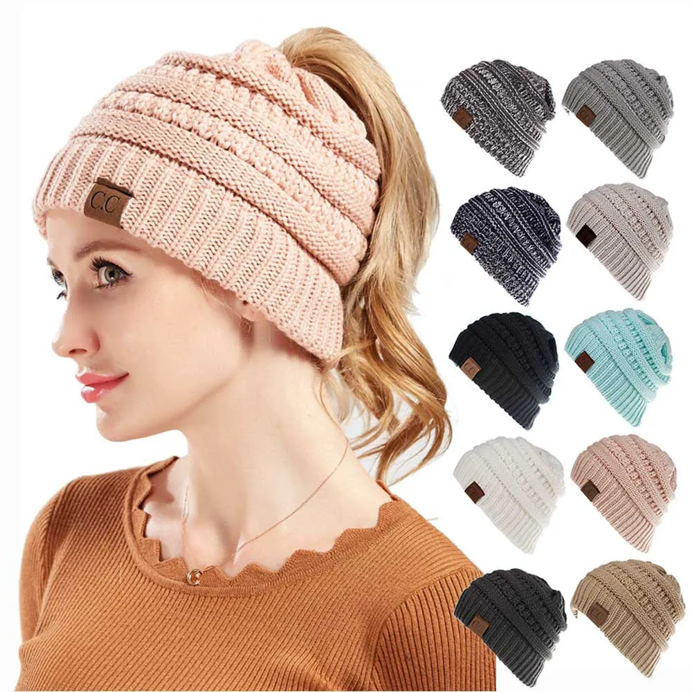 New Europe and The United States Explosive Autumn and Winter New Can Tie A Ponytail Wool Hat Cold Warm Knit Cap CC Label Ear Cap