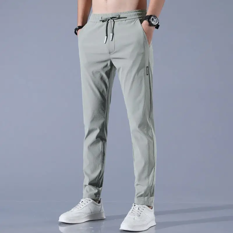 Pantaloni elasticizzati ad asciugatura rapida da uomo Pantalones elapsticos de secado ralpido para hombres