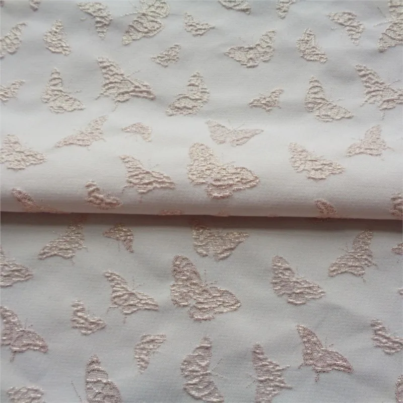 A new elastic jacquard dress with embossed and small three-dimensional gold thread in apricot pink