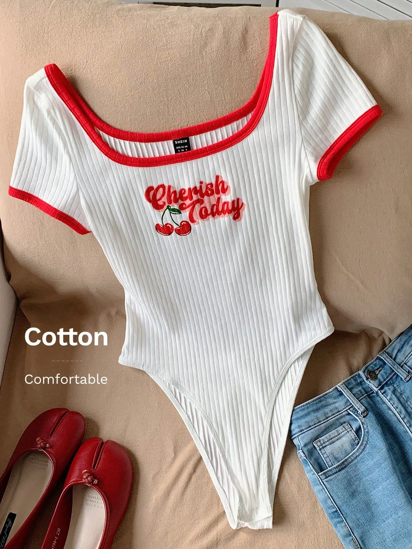 

White Ribbed Cotton Bodysuit with Red Trim and Cherry Graphic Print