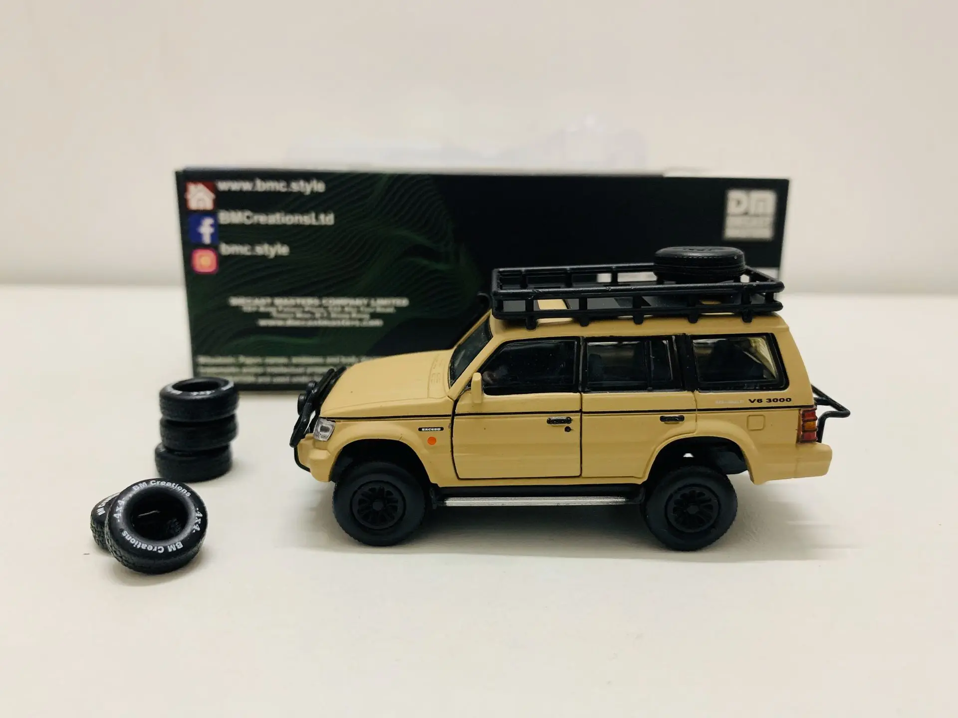 2Gen Pajero Jungle Pack Ivory (LHD) 1/64 Scale Diecast Miniature Car