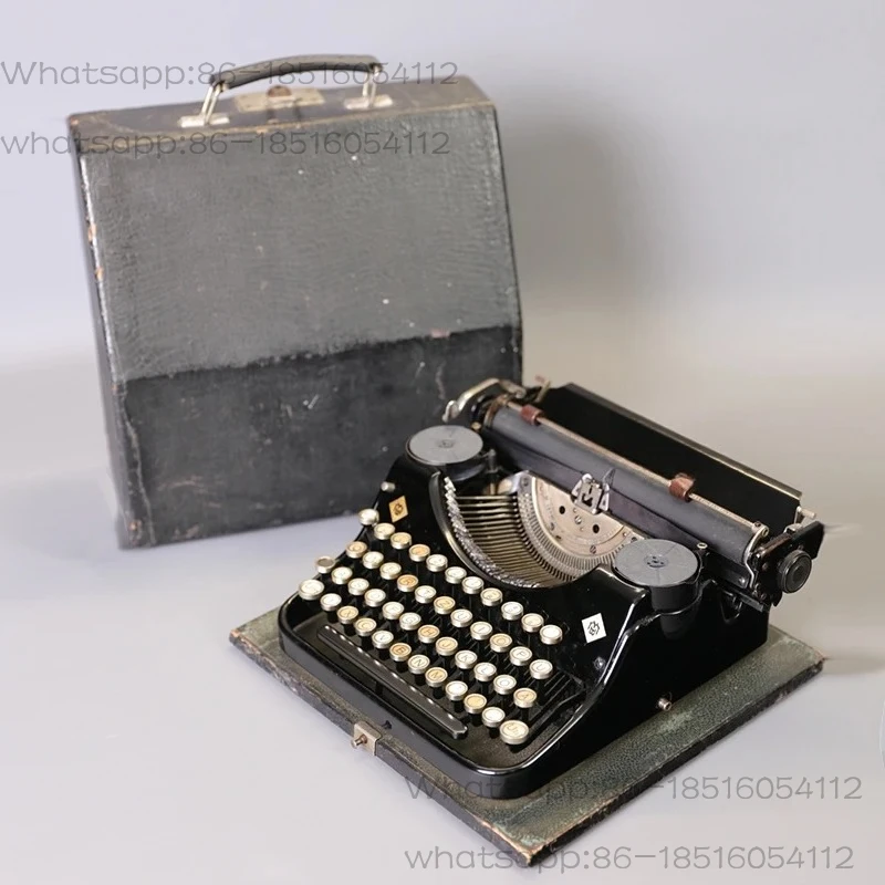Typewriter, German mechanical, English German keyboard, normal use, antique art