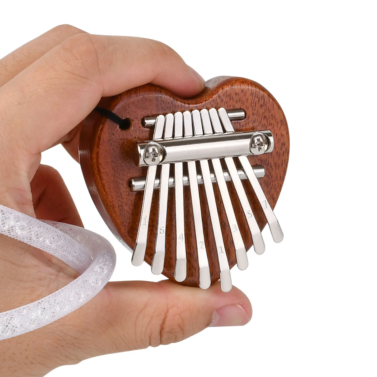

Mini 8-tone Thumb Piano Kalimba Backpack Decorative Gift + Lanyard (mahogany Core Solid Wood Heart Shape)