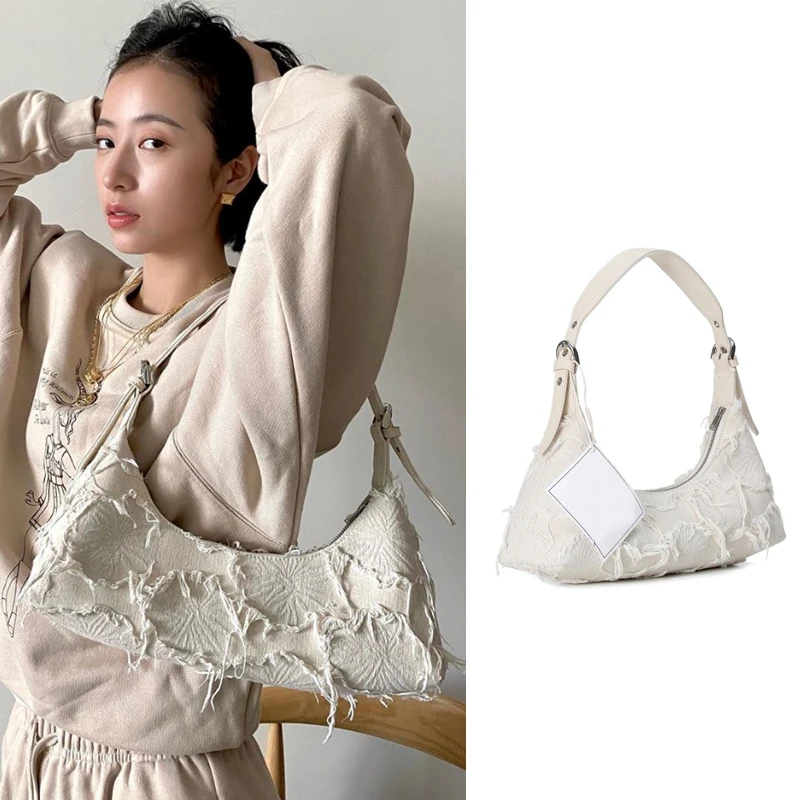 

Niche Designer Brand Korean New High Quality Fashion Patchwork Canvas Tassel Bag Single Shoulder Underarm Bag Woman Hot Sale