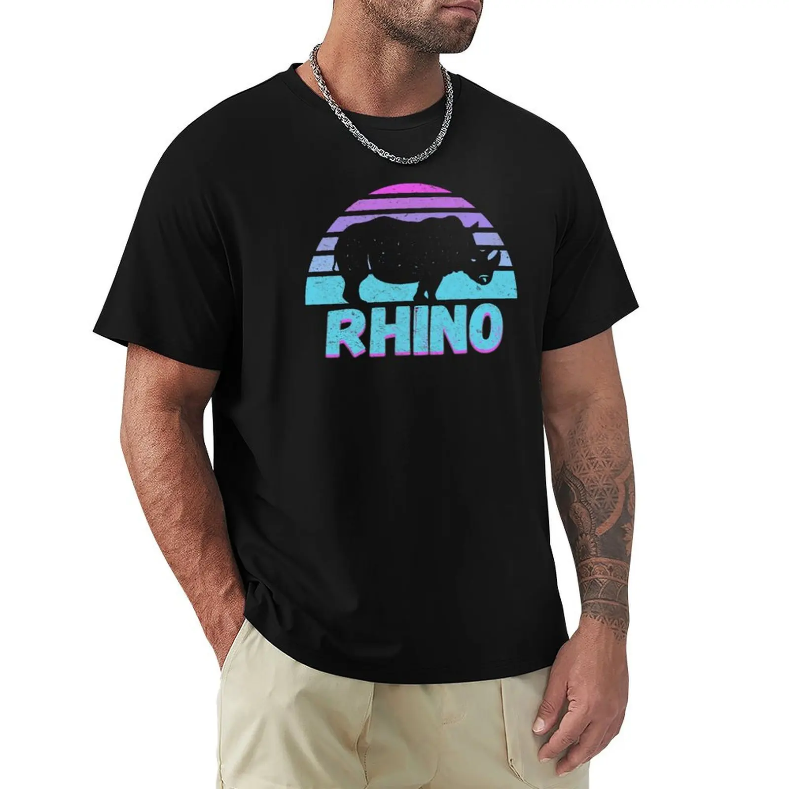 

Rhinoceros in front of sunset silhouette T-Shirt new edition cotton man t-shirts mens graphic t-shirts funny