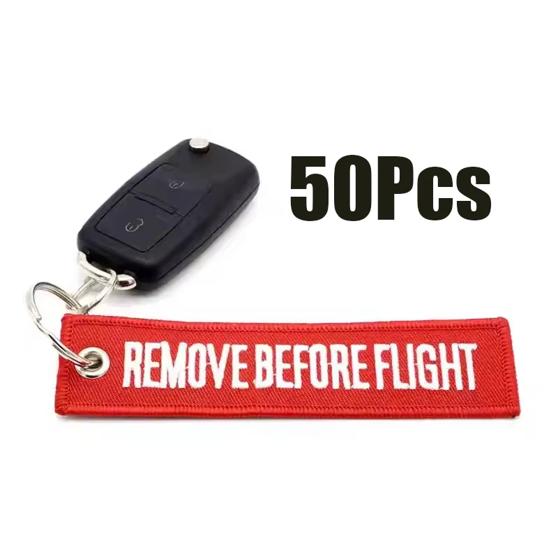50-piezas-de-correas-rojas-bordadas-con-la-frase-'remove-before-flight'-para-llaves-de-coche-y-bolsos