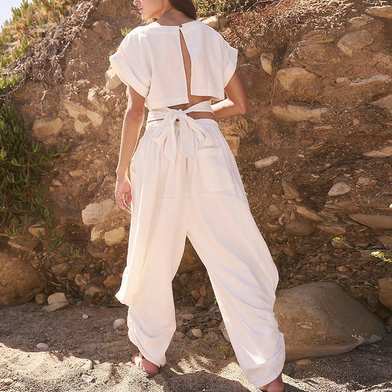 

Casual Street Pleated Pocket Outfit Female O Neck Short Sleeve Top & Wide Leg Pants Two Piece Set Sexy Backless Loose Beach Suit