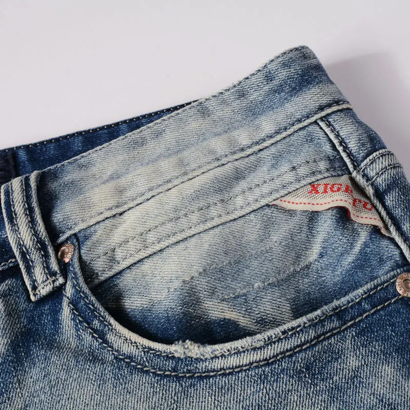 Fashion Designer Men Jeans High Quality Retro Light Blue Elastic Slim Fit Ripped Jeans Men Buttons Vintage Denim Pants Hombre