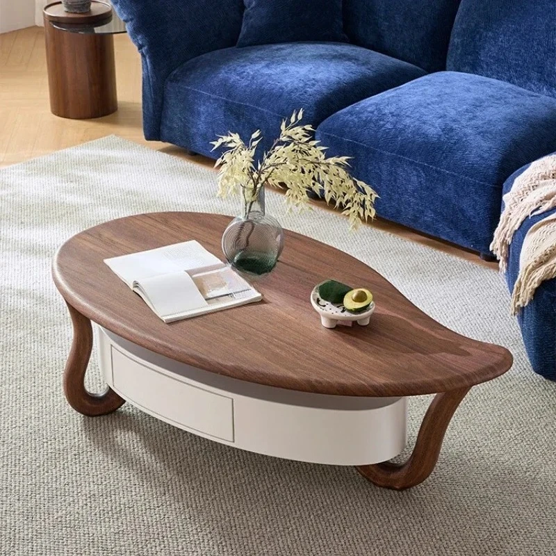 

Современный простой журнальный столик необычной формы для гостиной в стиле петал-дизайн.