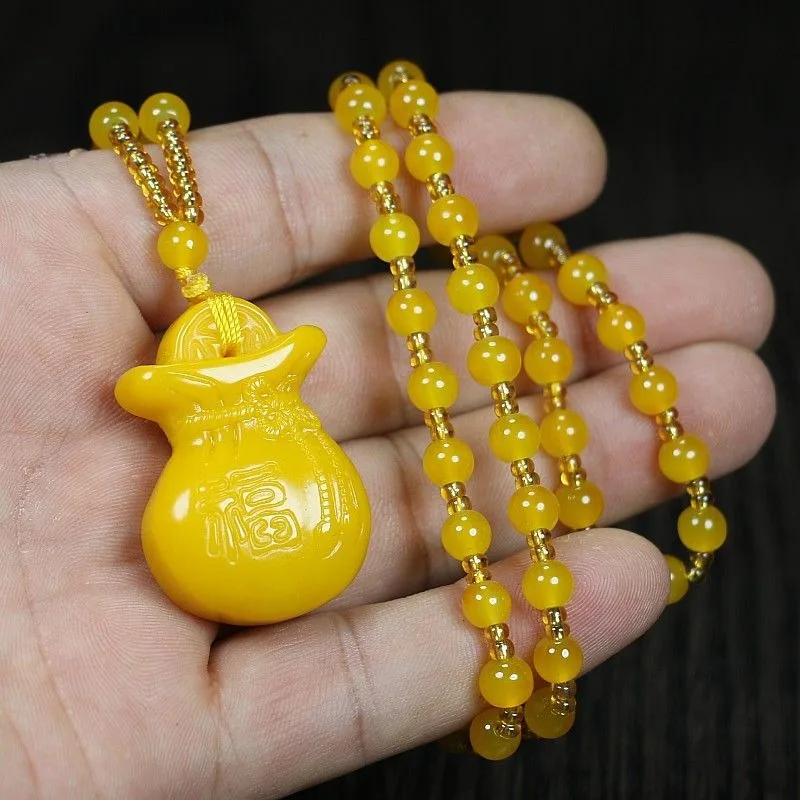 

Huanglong Jasper Has Money Pendants From Generation To Generation, Money Men's and Women's Necklaces