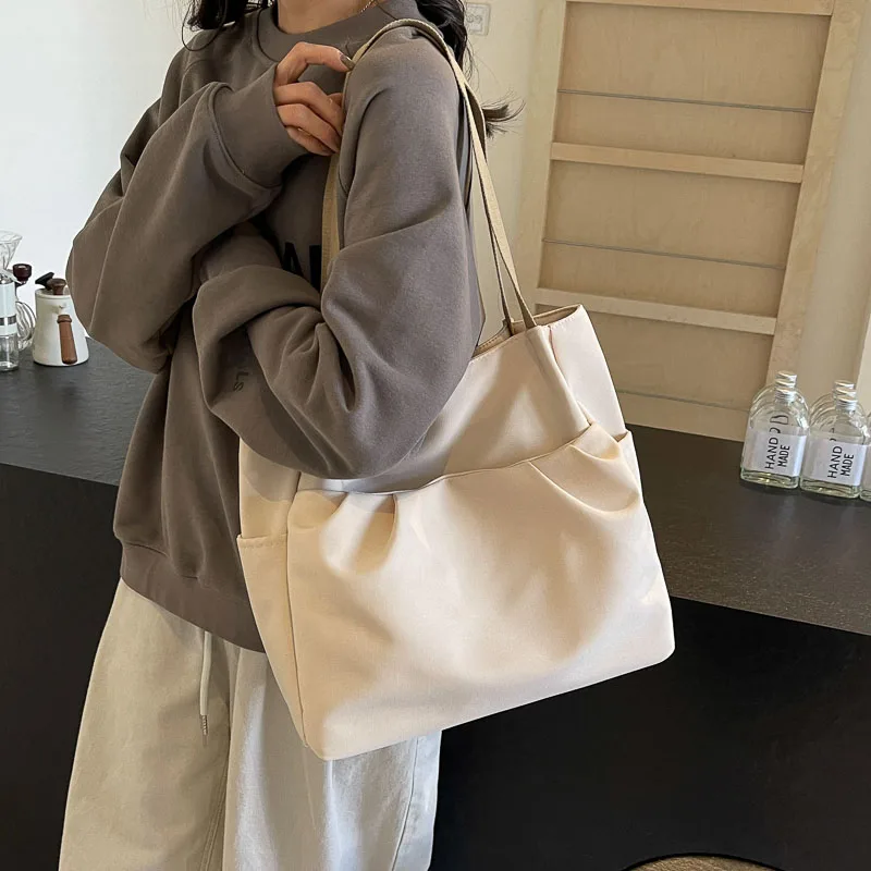 

New Fashion Women's Large Capacity Canvas Trend Single Shoulder Tote Commuting Bag Outdoor Simple Casual Hundred Commuting Bags