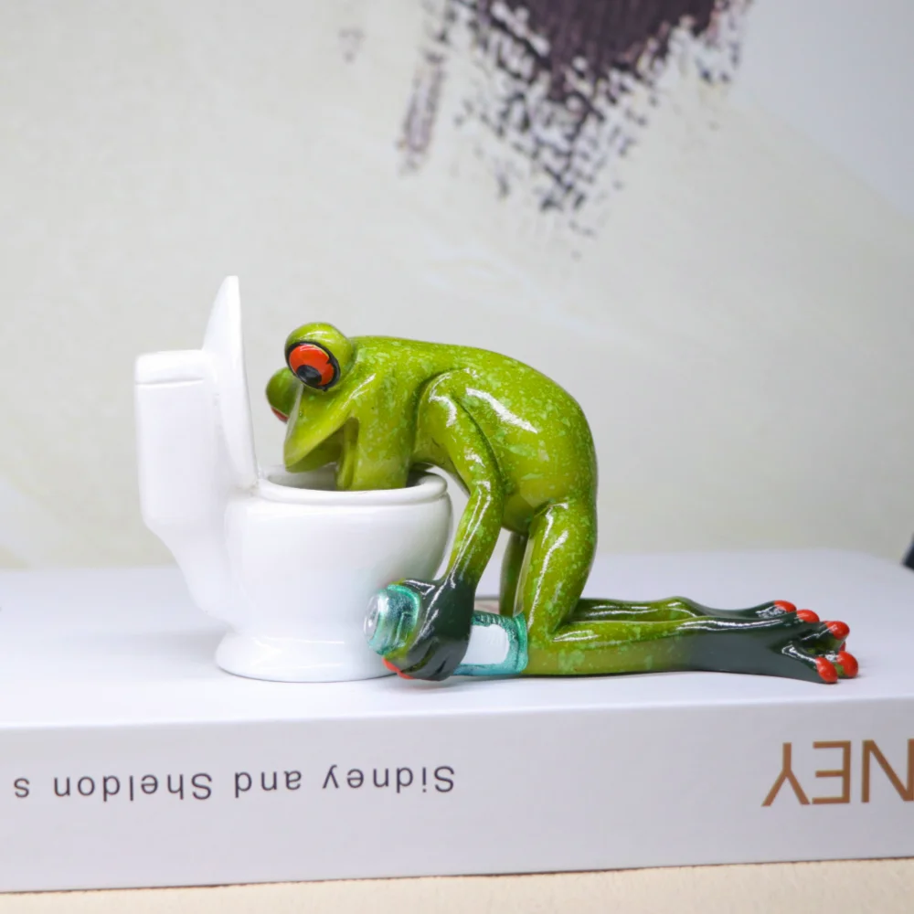 

Creative Home Desktop Decoration Vomiting Toilet Frog Ornament Bathroom Study Decor Gift Funny Animal Model Collectibles Objects