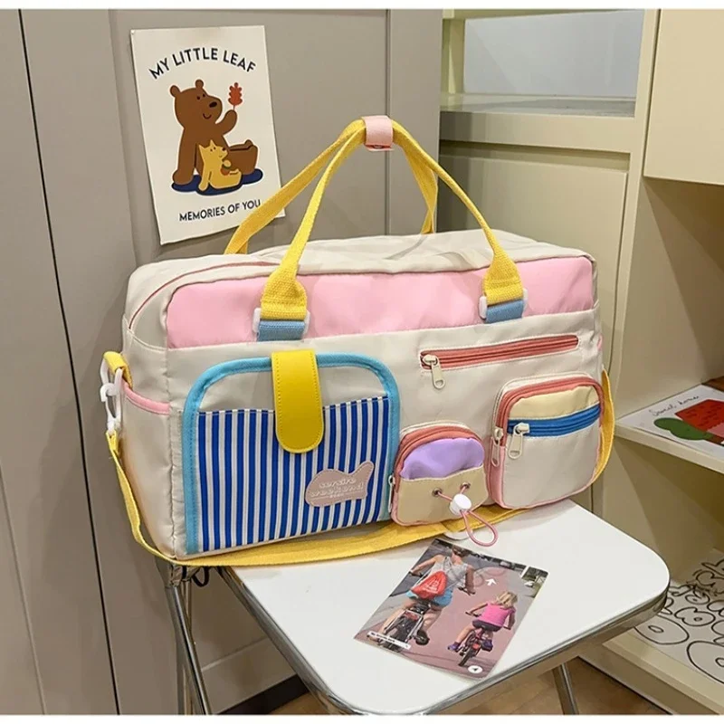 

Contrasting color travel bag Large capacity outdoor multi-functional fitness bag One shoulder messenger luggage